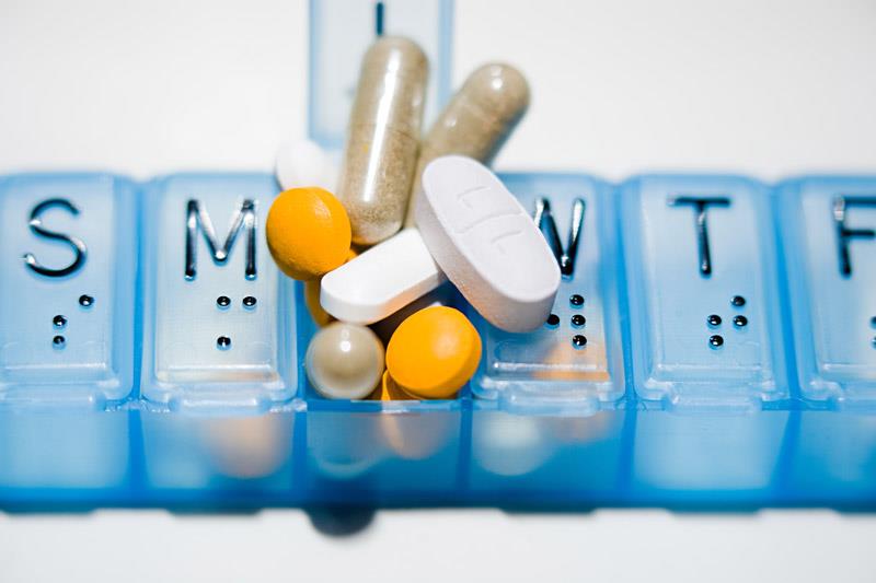 Pill box with tablets inside